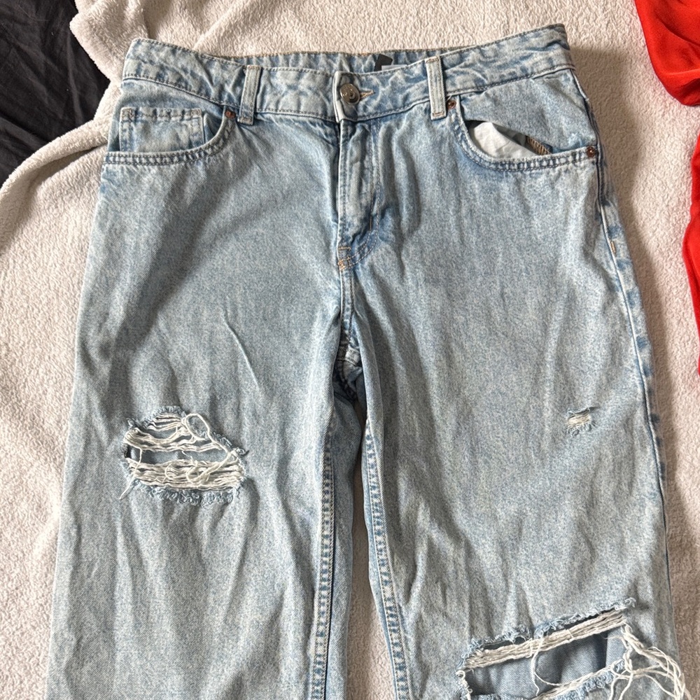 Distressed Light Blue Jeans